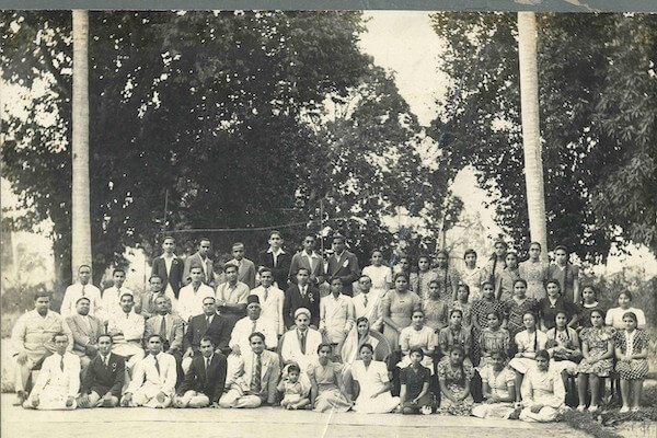 Tajbibi and Alwaez Abualy with students and officers of the Ismailia Mission Centre, Dar es Salaam, 1948 or 1949