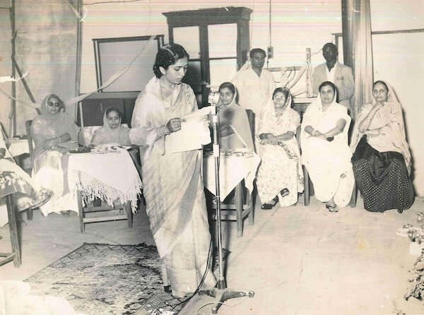 Tajbibi delivering a speech at a Muslim Women's Association meeting, late 1940s or early 1950s