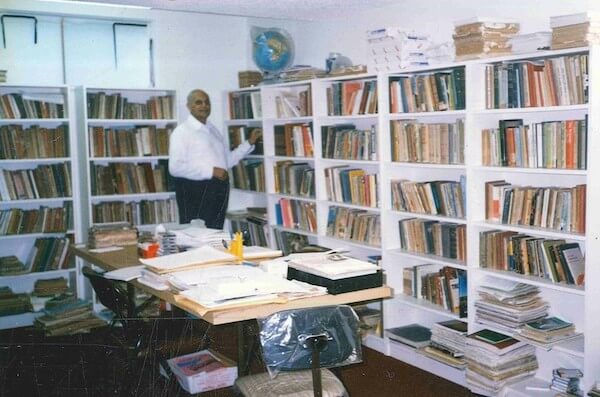 Alwaez Abualy in his library at his home in Burnaby, British Columbia, ca 1990s